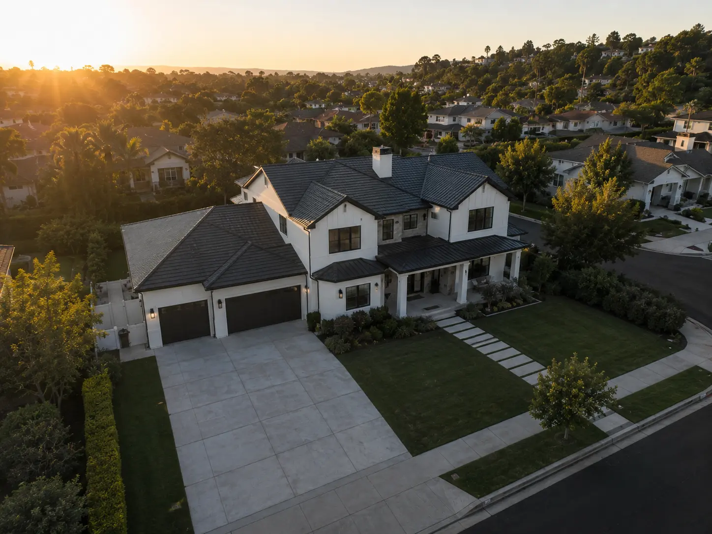 Suburban modern farmhouse at golden hour